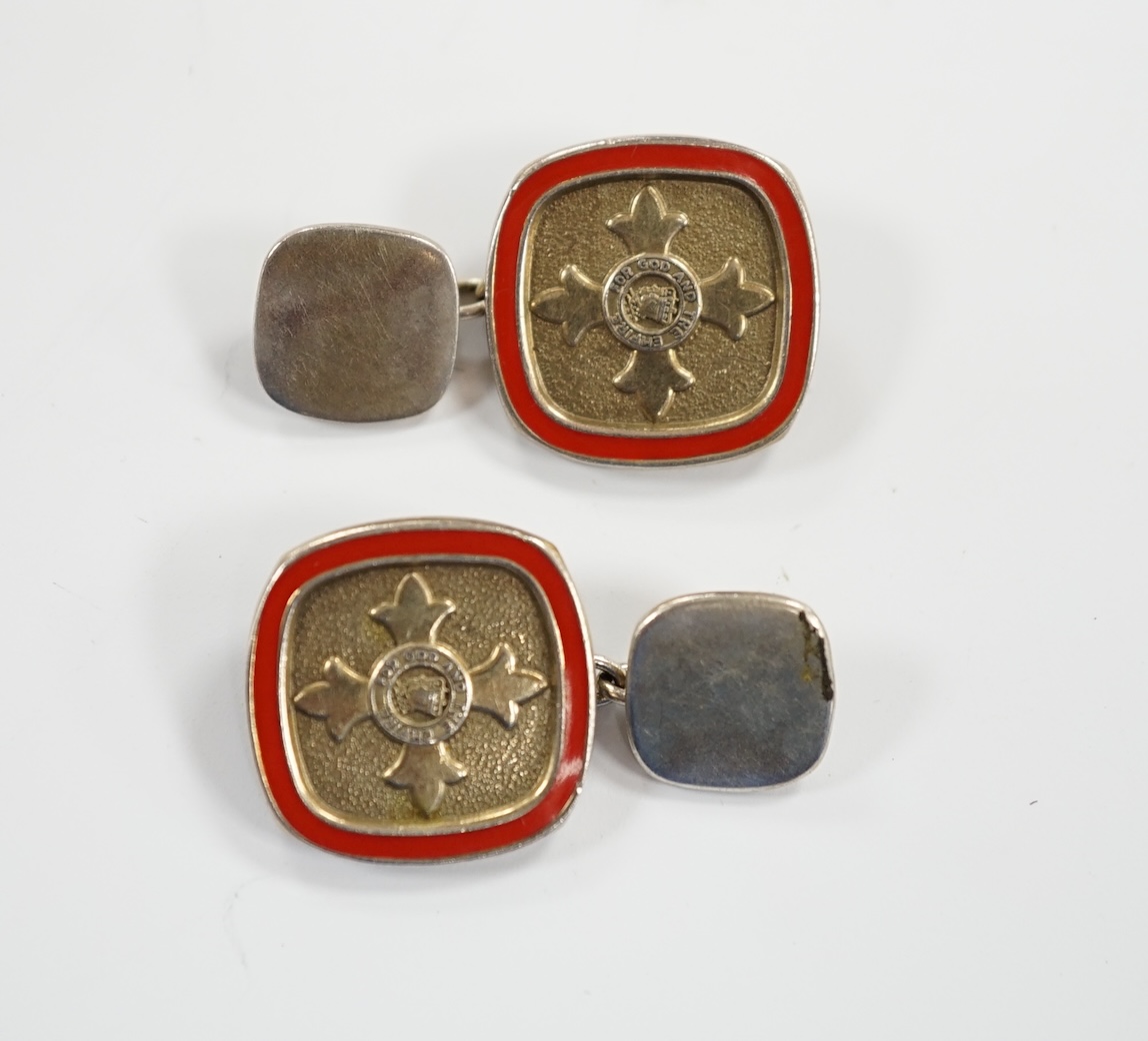 A modern pair of silver and red enamel cufflinks, embossed with the Order of The British Empire, by Toye, Kenning & Spencer, 19mm.